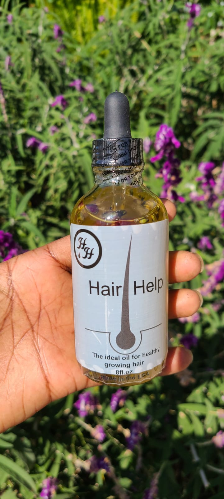 Huile de traitement capillaire Hair help