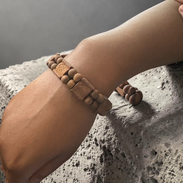 Bracelet multirangs en perles de bois